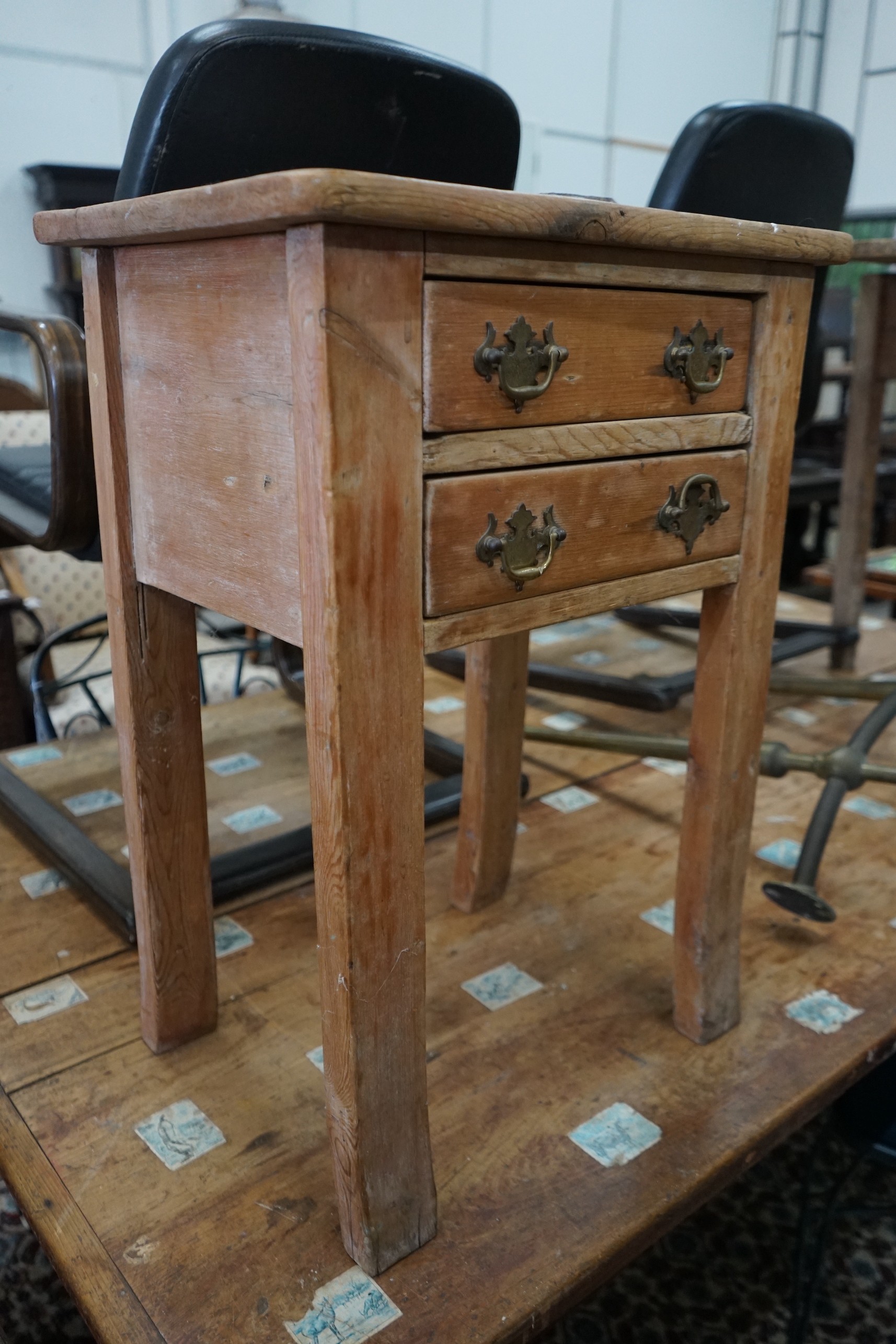 A Victorian pine two drawer book press table, width 50cm, depth 36cm, height 71cm